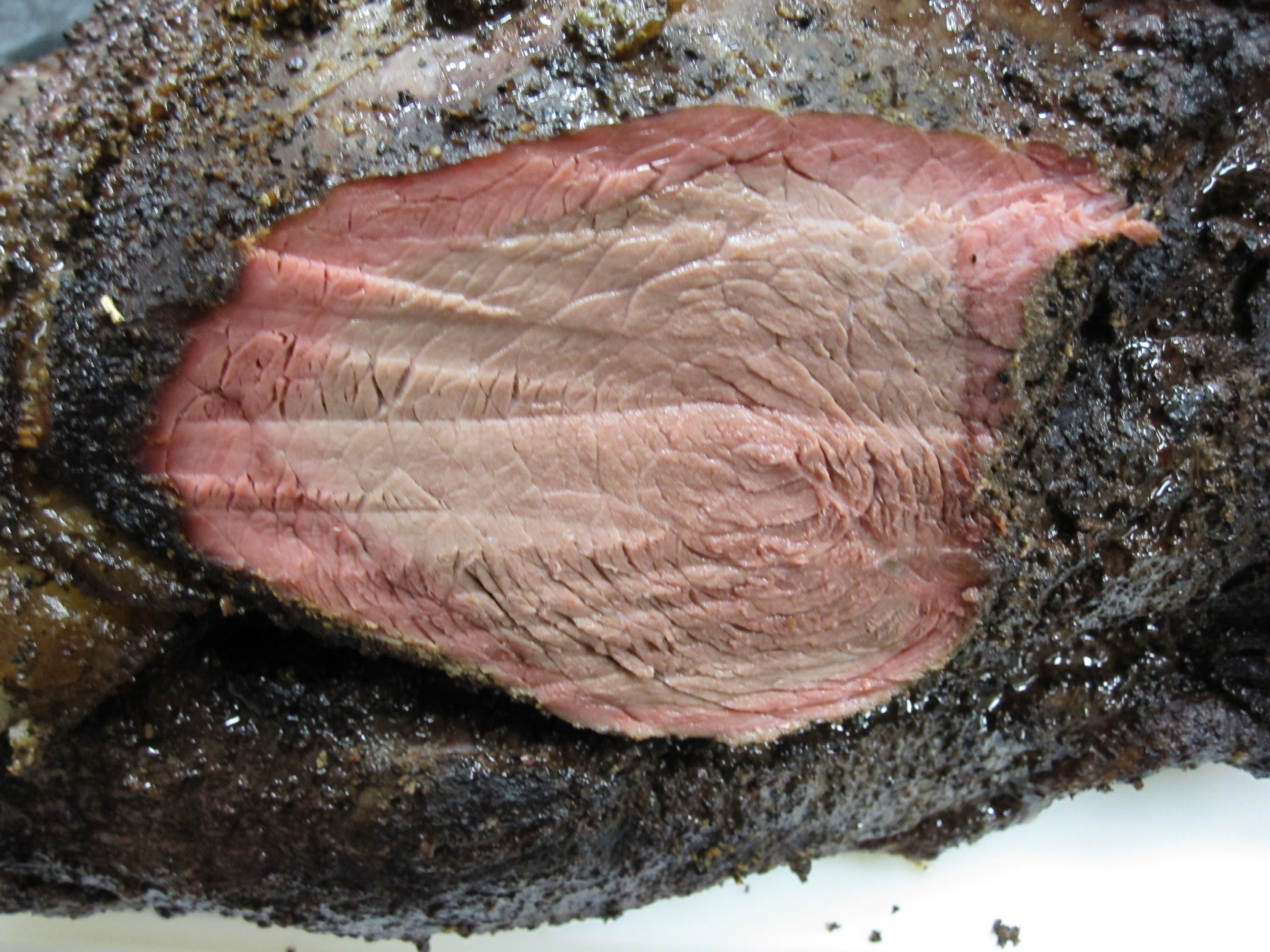 A close up of a cooked beef brisket.