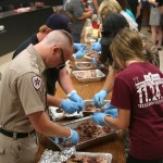 Assembly line of pork pullers