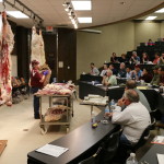 Davey Griffin with beef carcasses and cuts