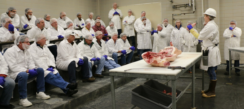 Barbecue Summer Camp participants learning about cuts of pork