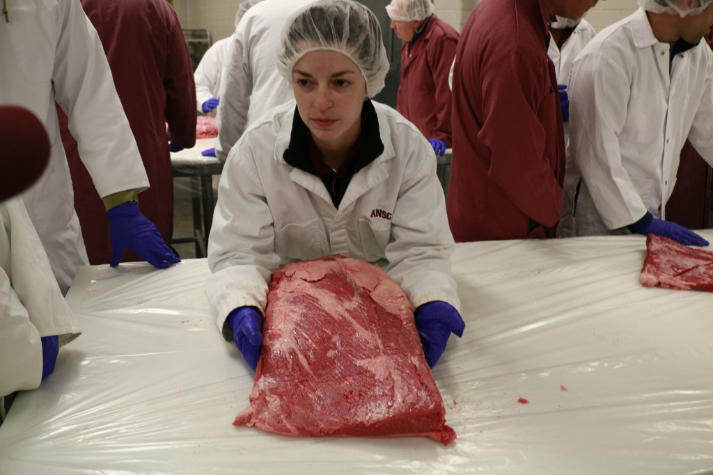 Helen Kline discussing a brisket