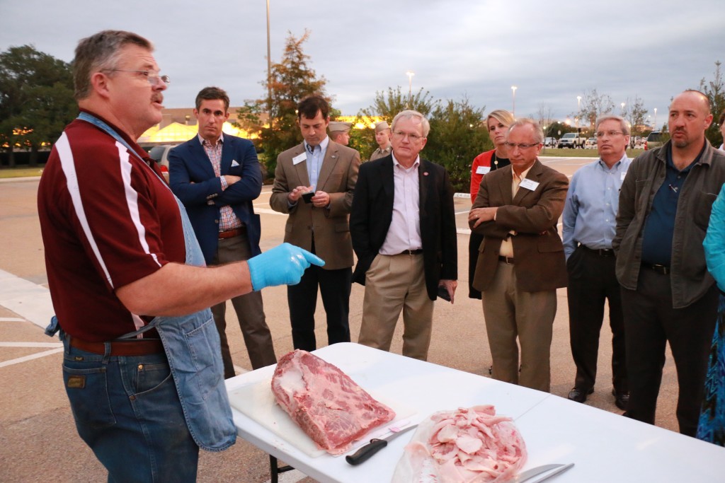 Davey Griffin demonstrating trimming of briskets