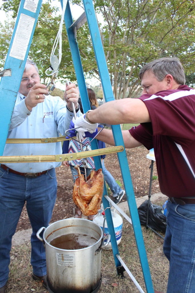 Davey Griffin and Ray Riley checking the turkey out (photo by Kathleen Meredith)