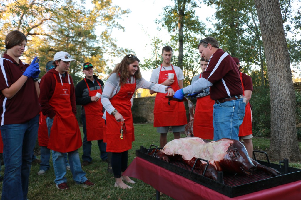 Ray serving pork to students
