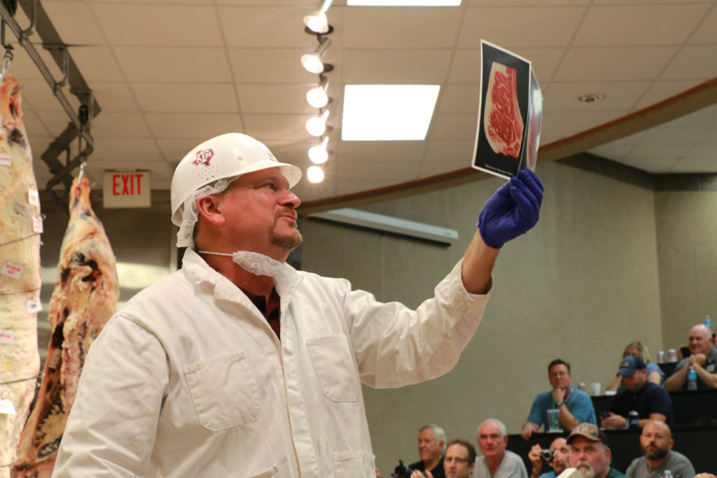 Ray Riley describing beef grading using beef marbling charts