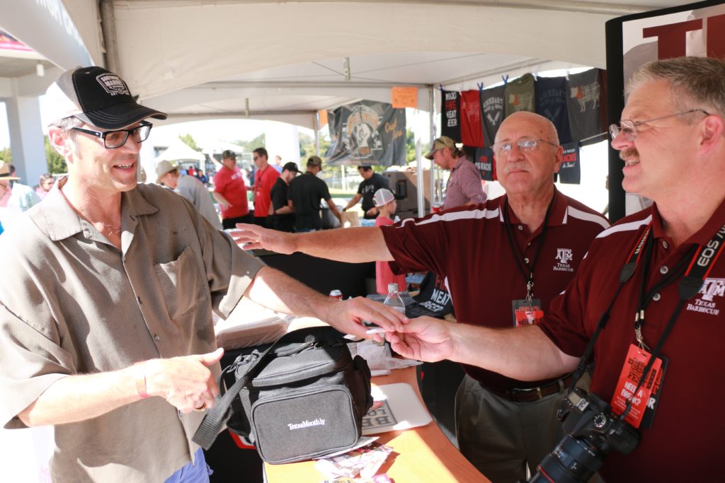 Jack Timmons, Jack's BBQ, Seattle, being greeted by Jeff Savell and Davey Griffin