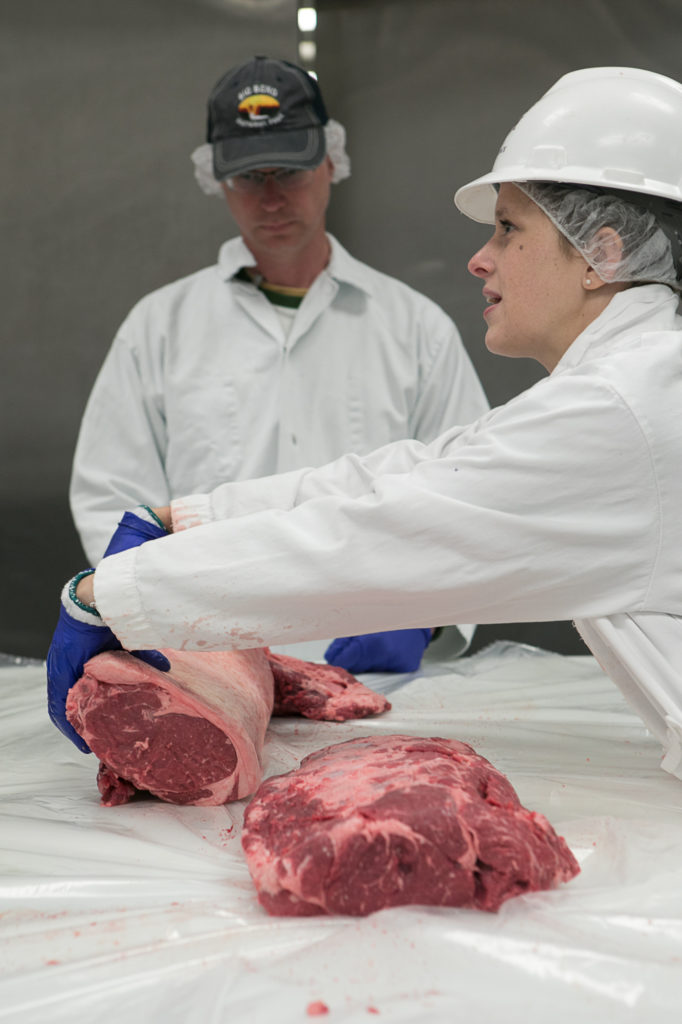 TAMU graduate student Aeriel Belk teaching about beef middle meats.