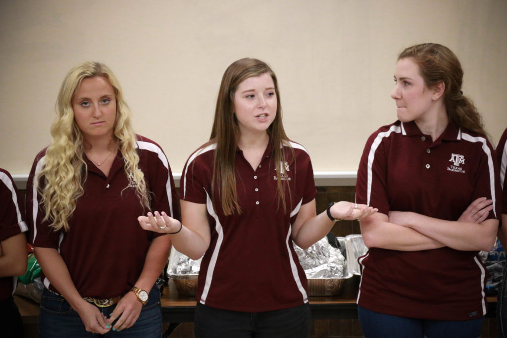 Kenzie Lackey (middle) introducing herself to ANSC 117, Texas Barbecue