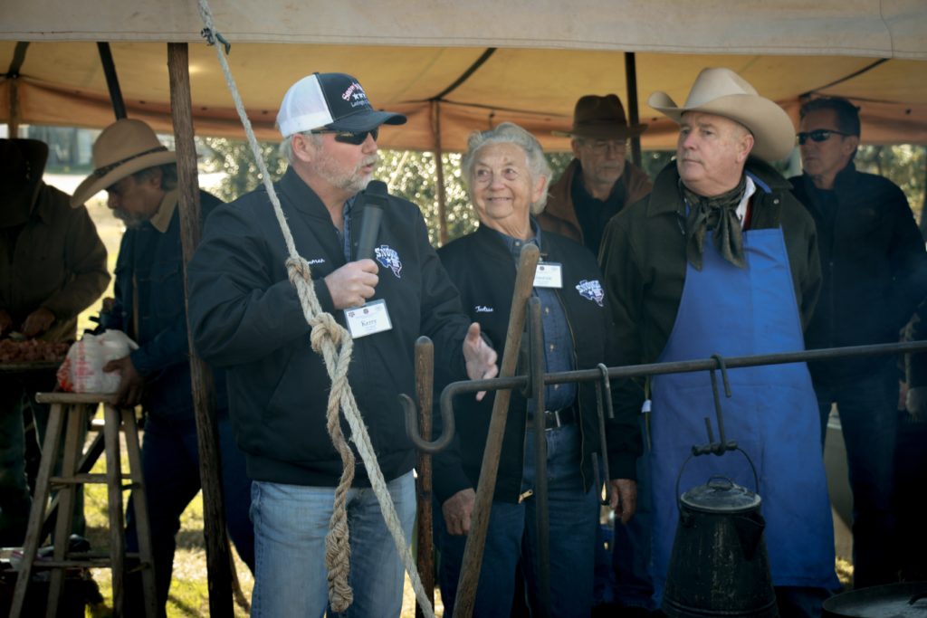 Kerry Bexley, Tootsie Tomanetz, and Homer Robertson talking about live coal cooking at Camp Brisket