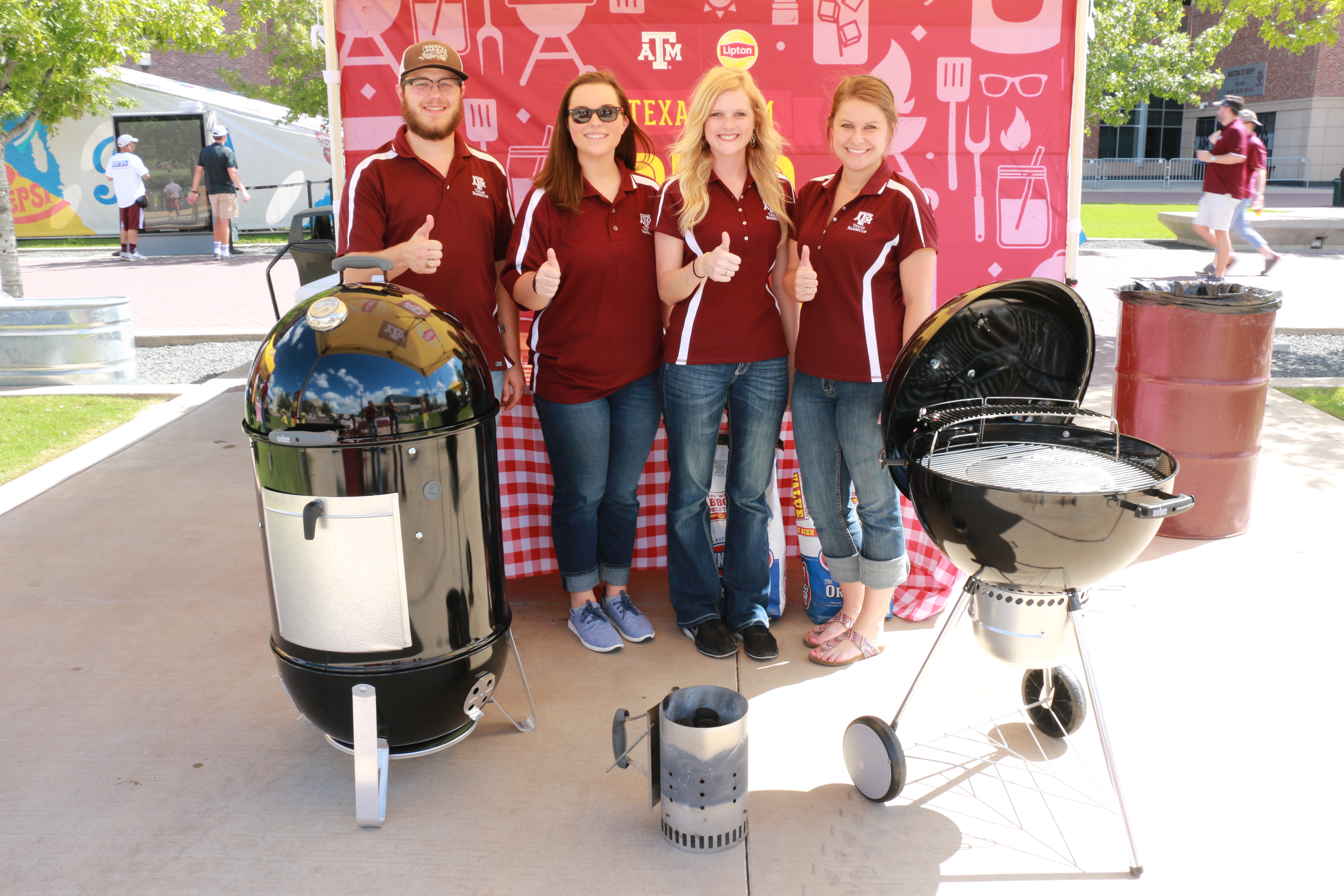 Ty, Chandler, Morgan, and Brogan with Weber Smokey Mountain Cooker Smoker and Weber Master-Touch Charcoal Grill