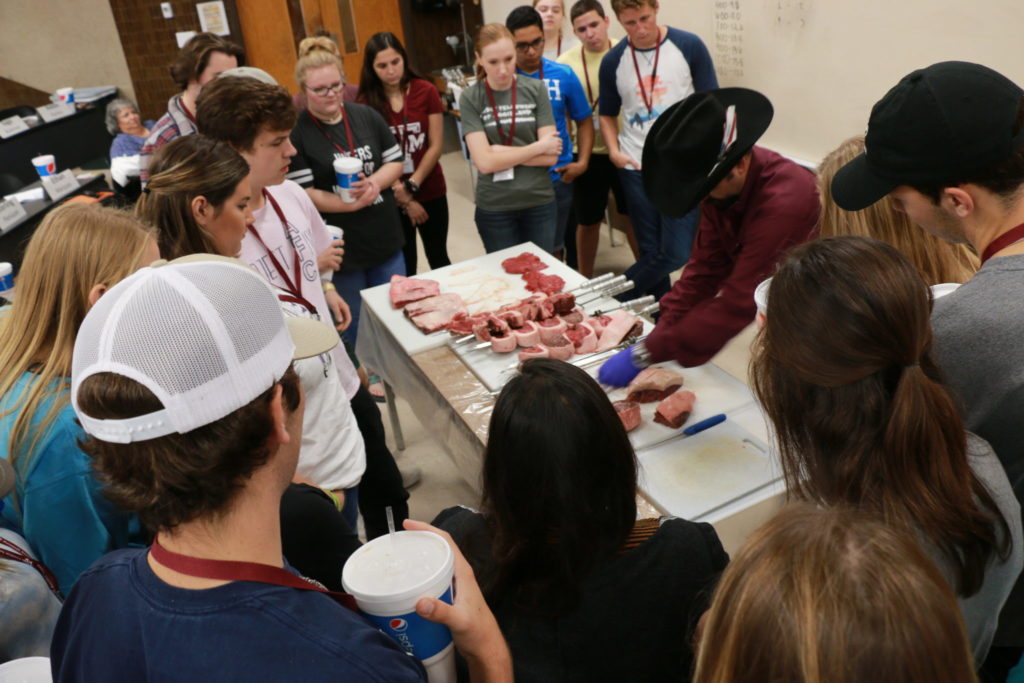 Flavio demonstrating how to load the skewers