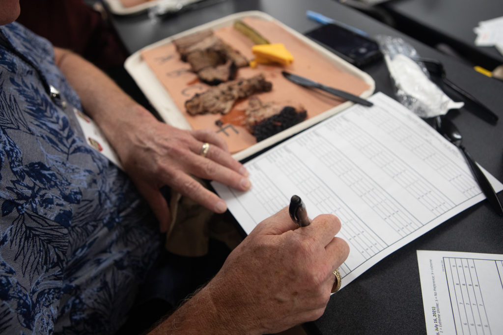 Participant completing taste ballot at Camp Brisket