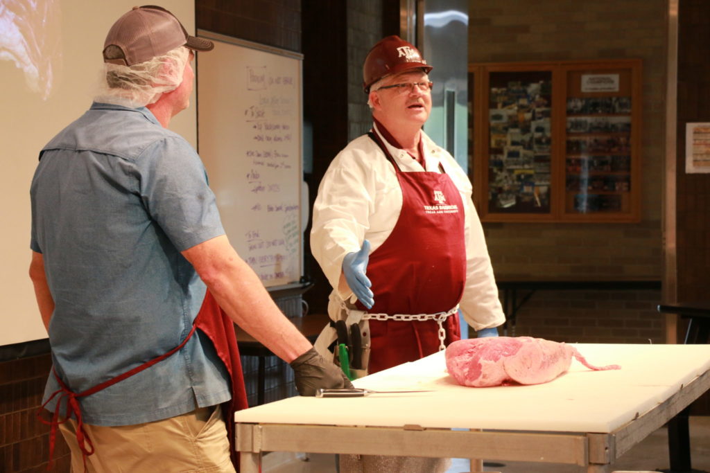 Davey Griffin and John Brotherton talking about trimming briskets